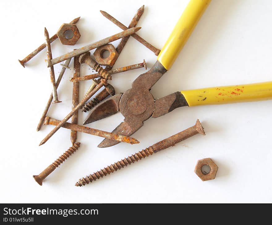 Rusty tools, screws, nails, nuts and bolts. Rusty tools, screws, nails, nuts and bolts.