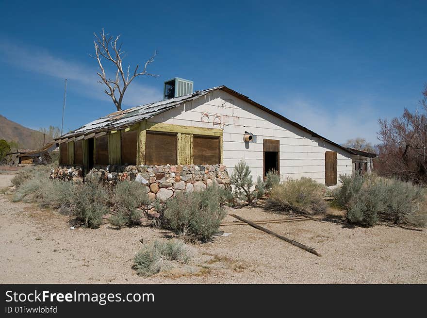 A boarded up cafe near Olancha California.