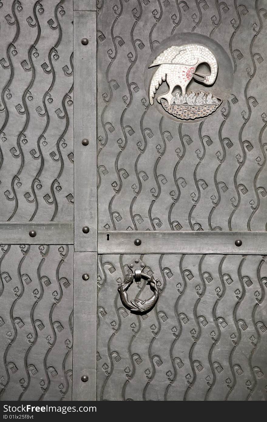 Metal door decoration. Detail of old metal iron entrance door.