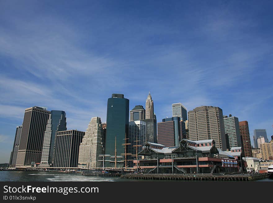 Lower Manhattan skyline along the Eeat River (includes the South Street Seaport). Lower Manhattan skyline along the Eeat River (includes the South Street Seaport).