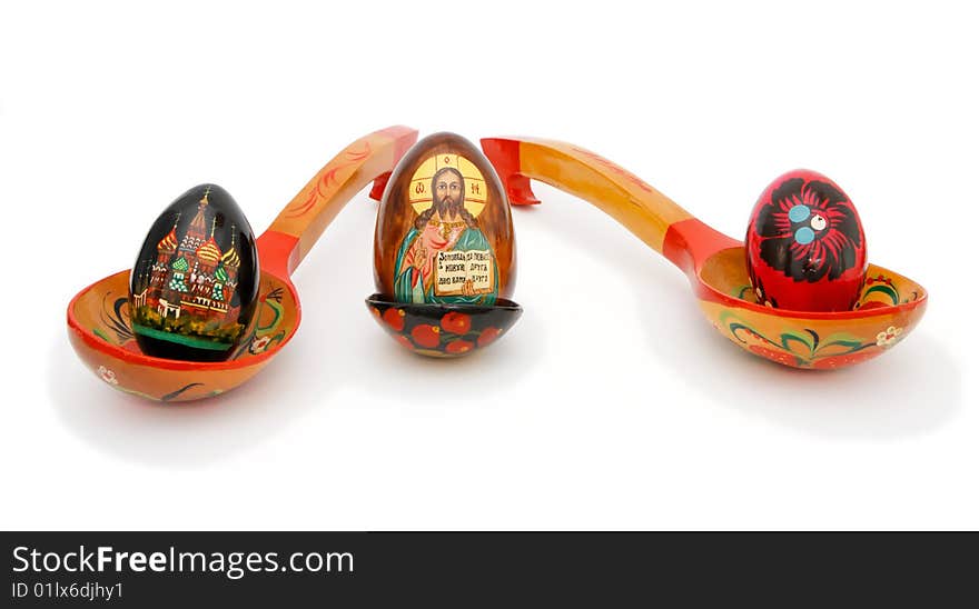 Easter eggs in Russian wooden painted spoons