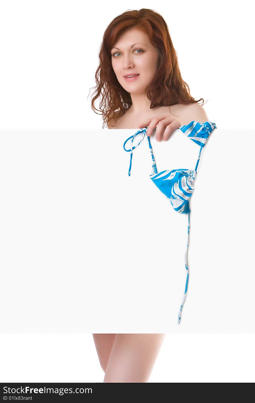 Undressed girl with a clean sheet in hands isolated on a white background. Undressed girl with a clean sheet in hands isolated on a white background