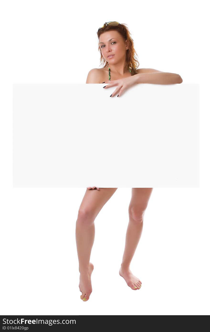 Undressed girl with a clean sheet in hands isolated on a white background