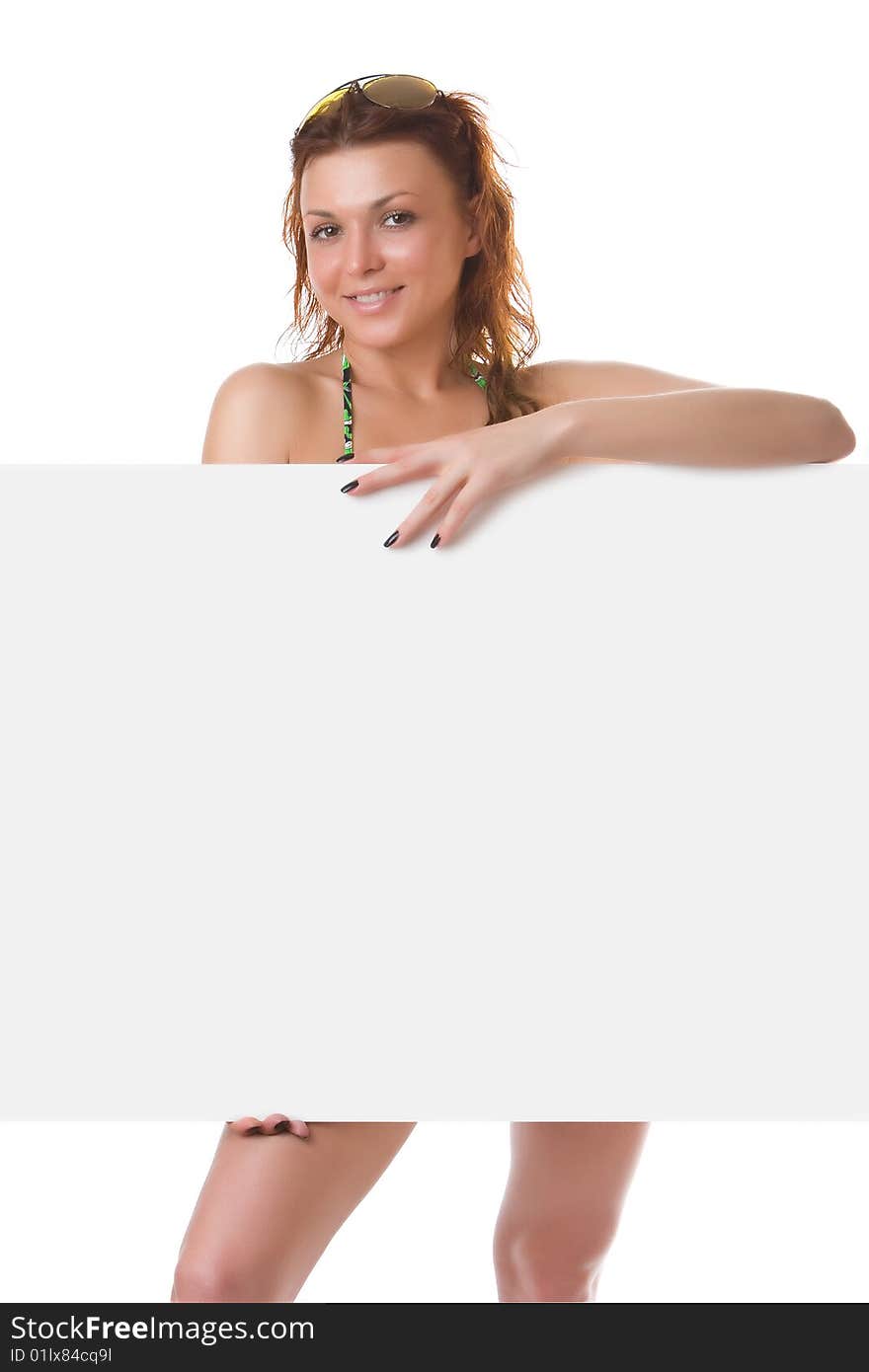 Undressed girl with a clean sheet in hands isolated on a white background. Undressed girl with a clean sheet in hands isolated on a white background