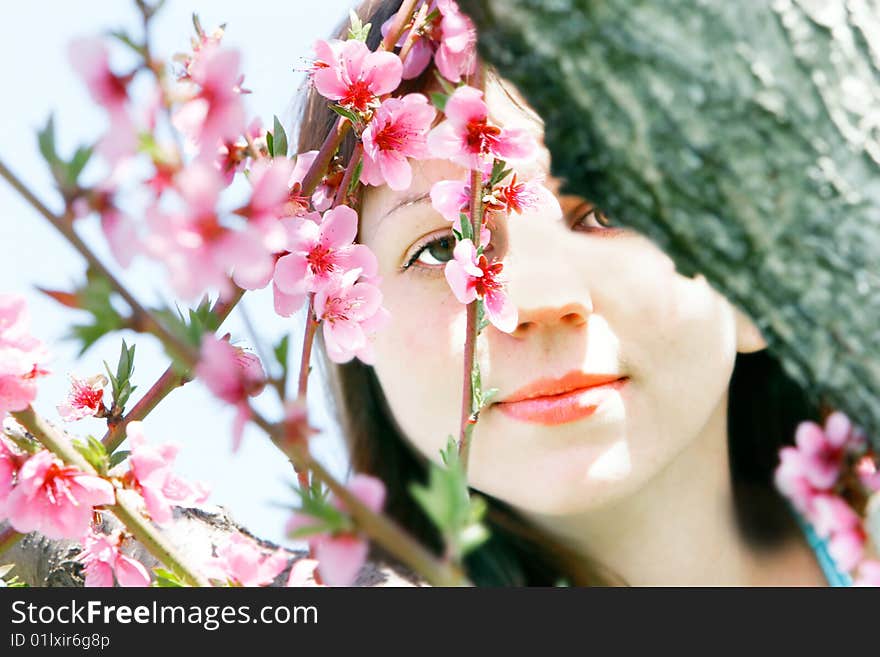 Young girl in spring garden