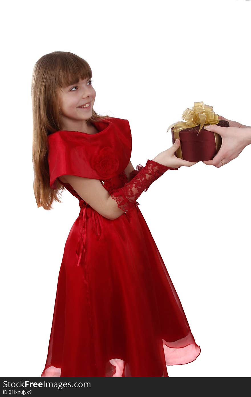 Beautiful girl with present. Little girl gets gift.  Attractive female is holding purple box with gold ribbon. Attractive lady is surprising at present. Isolated over white background. Schoolgirl feels shy. Beautiful girl with present. Little girl gets gift.  Attractive female is holding purple box with gold ribbon. Attractive lady is surprising at present. Isolated over white background. Schoolgirl feels shy.