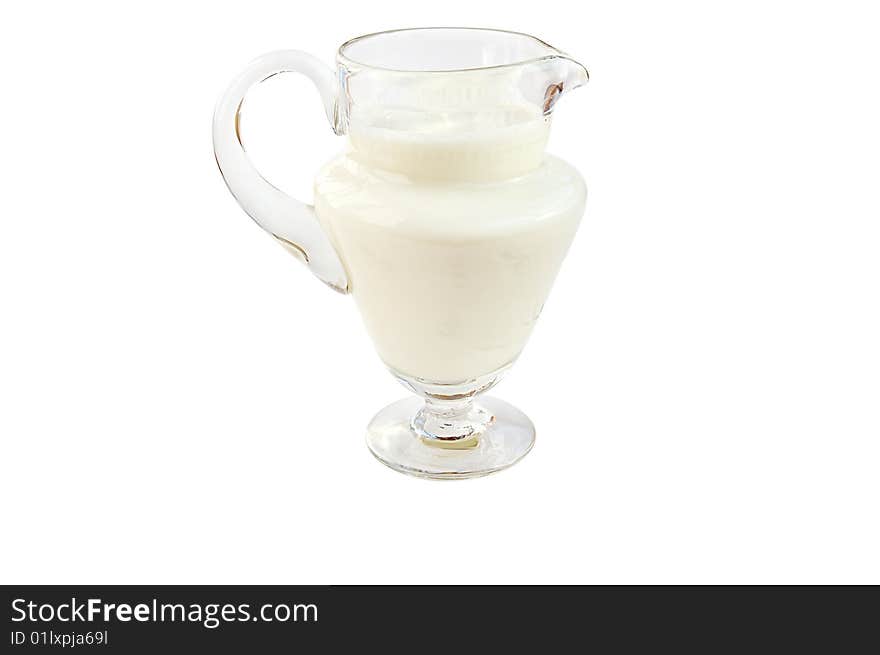 Pitcher of milk isolated over white background with clipping path. Pitcher of milk isolated over white background with clipping path.