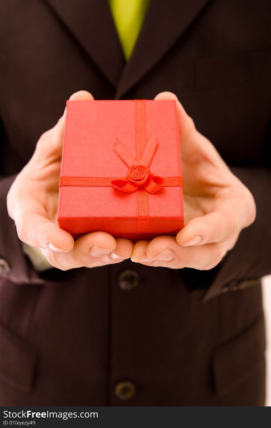 Man holding present on a white background