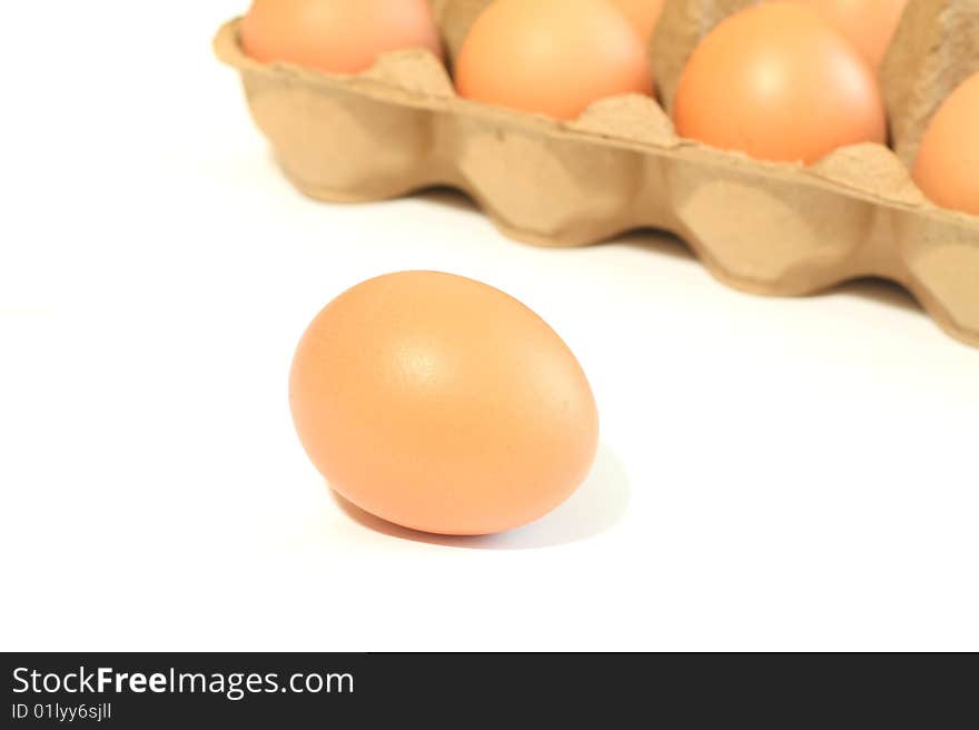 Eggs in box isolated on white background. Eggs in box isolated on white background