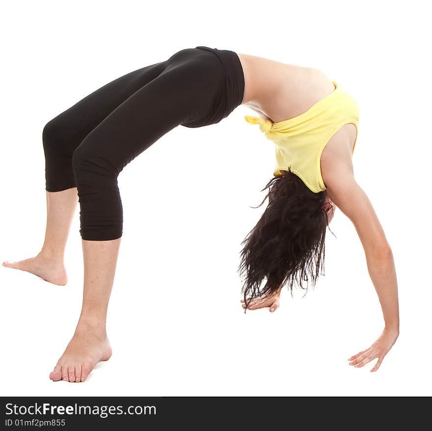 Young yoga female doing yogatic exericise