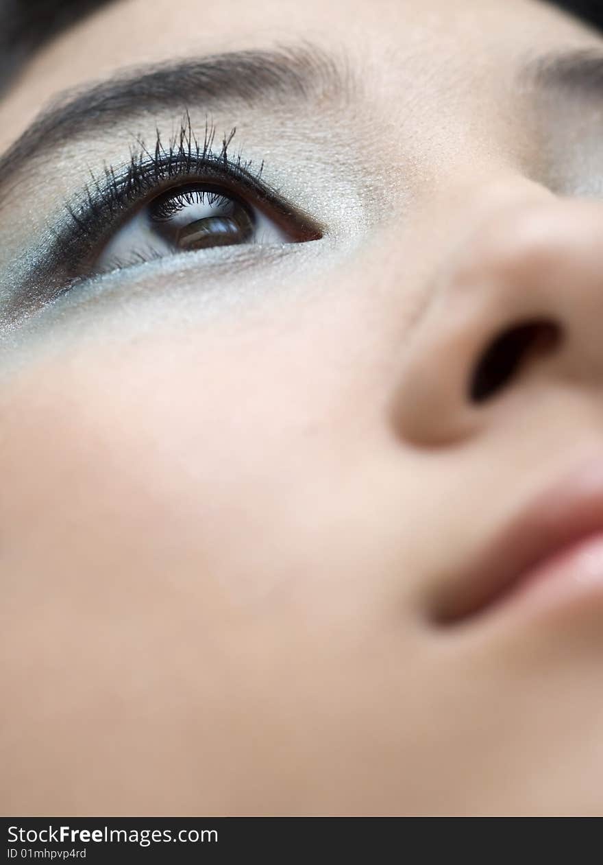 A young lady looking into the light. A young lady looking into the light