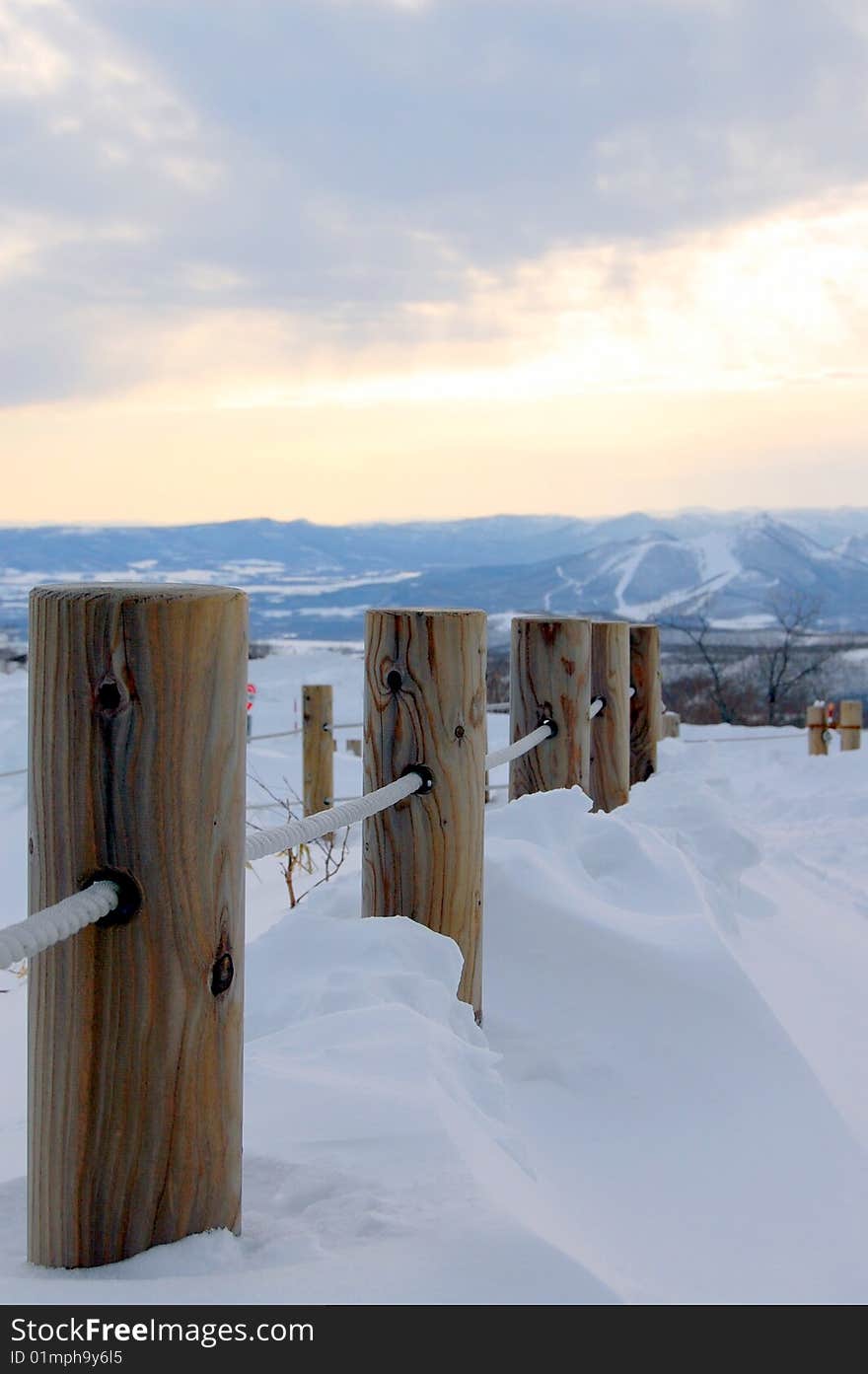 The wooden pillar buried in the snow in Hokkaido