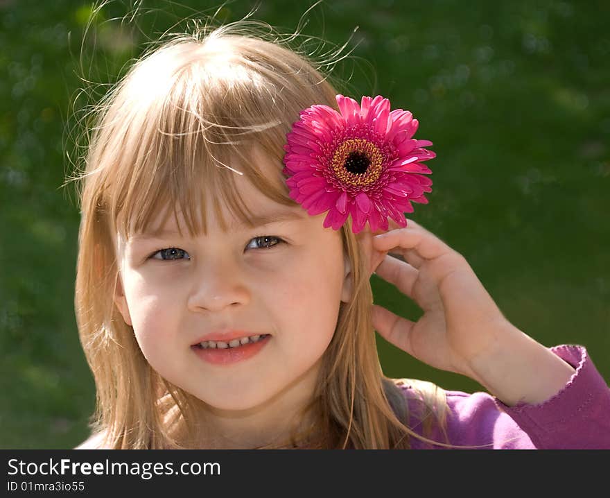 The beautiful girl with a flower in a head. The beautiful girl with a flower in a head.