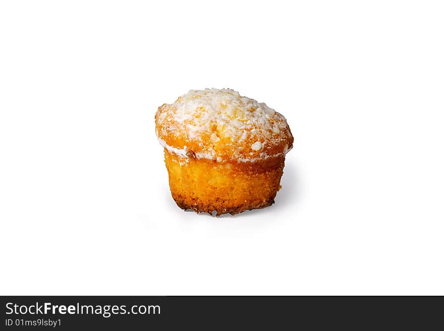 A single small muffin with sugar icing. A single small muffin with sugar icing