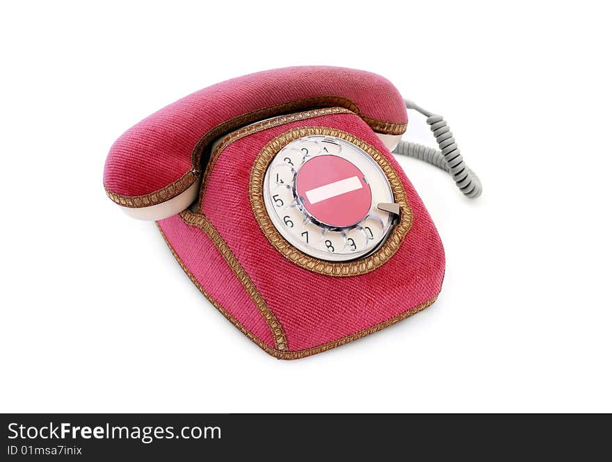 Red phone with dial plate on isolated background