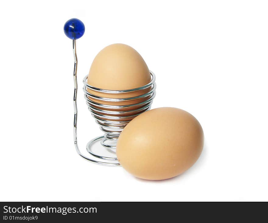 Two eggs in a metallic support