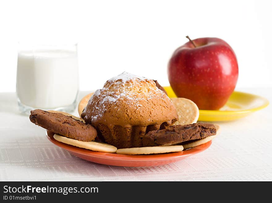 Healthy breakfast - milk, fruit and pastry