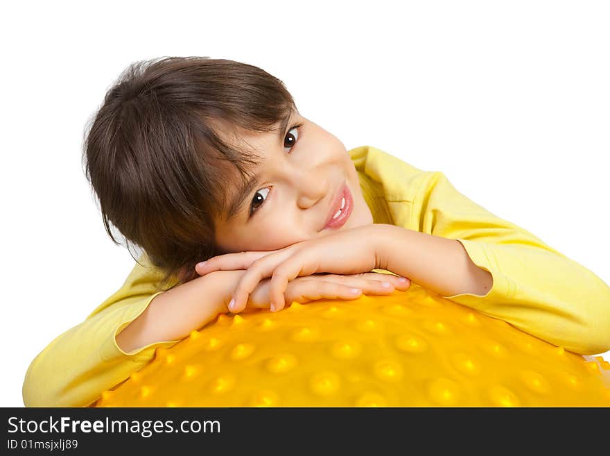 Laughing young girl on the yellow ball. Laughing young girl on the yellow ball