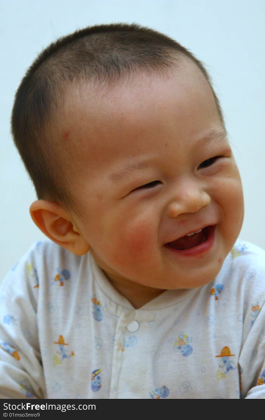 Asia kid laughing close-up portrait. Asia kid laughing close-up portrait