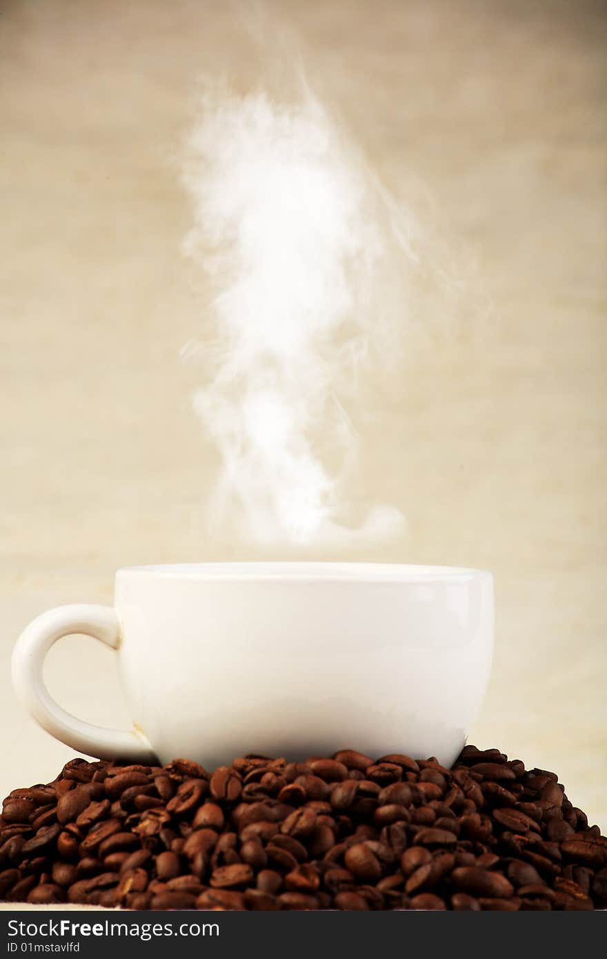 Coffee background: close-up of a beans cup, mill. Coffee background: close-up of a beans cup, mill