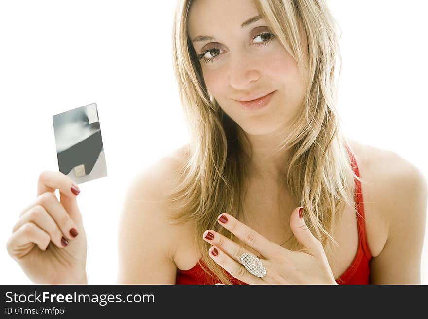 Credit card and jewellery, white background