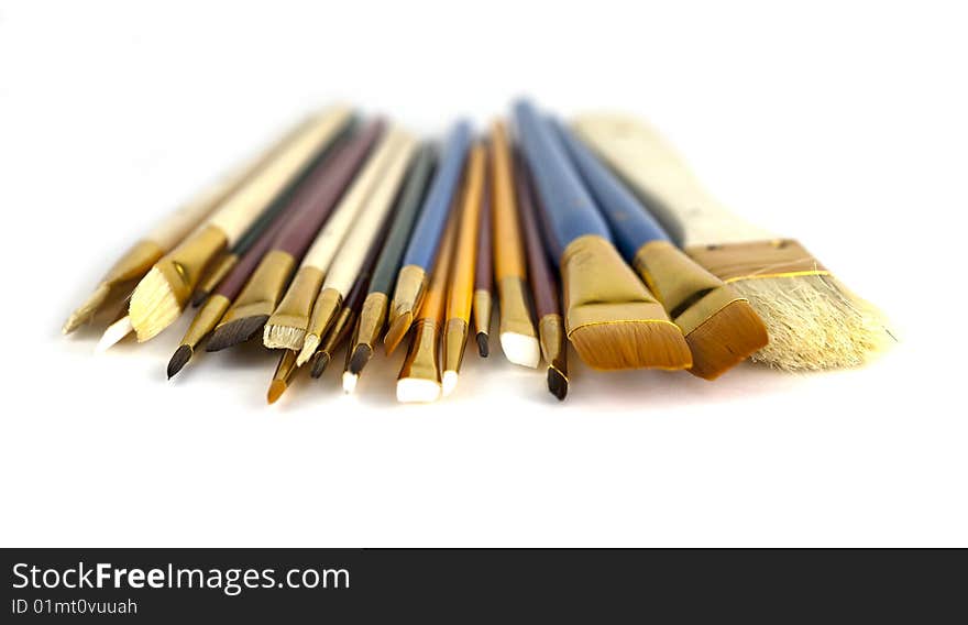 Collection of Different Sized Paintbrushes - Front on. White Background.