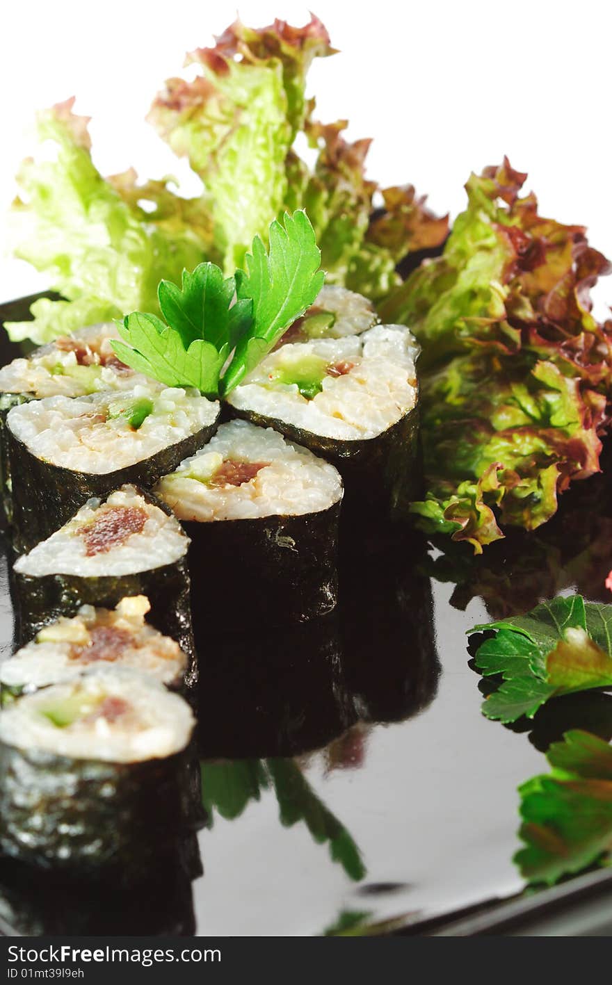 Japanese Cuisine - Sushi with Salad Leaf and Parsley