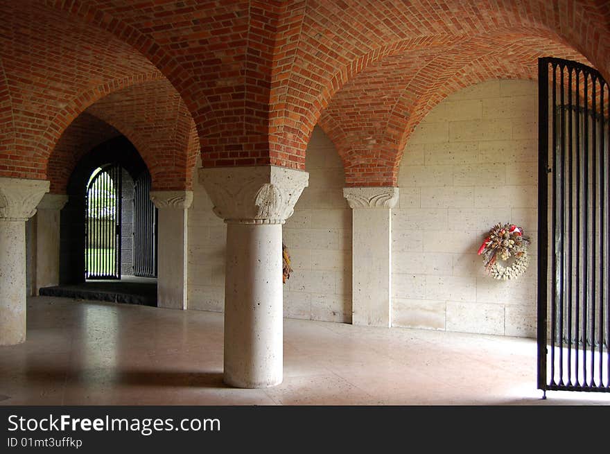 Inside the building of a military graveyard.