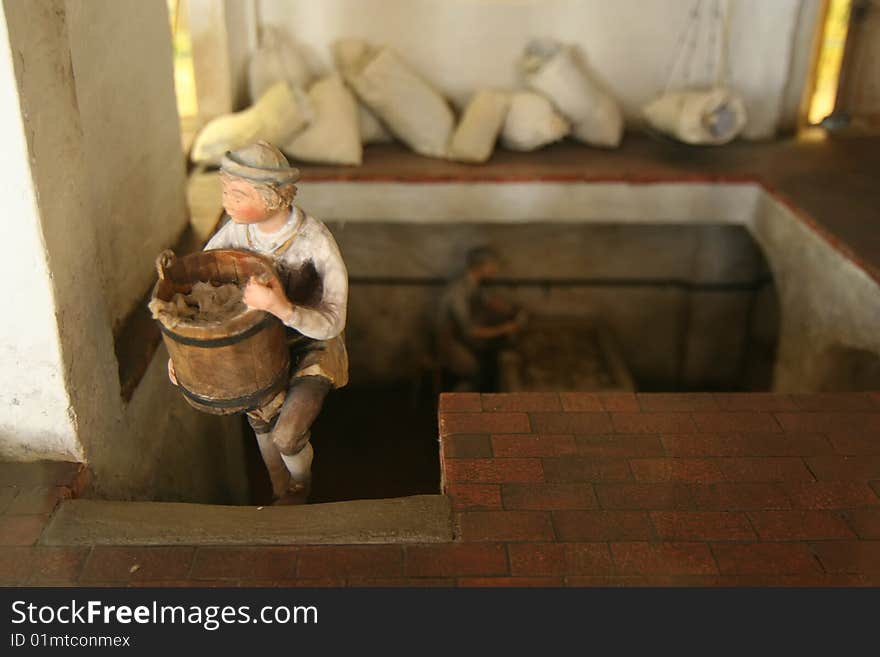 A model of traditional printing factory. A traditional production line accomplishes all the steps needed to transform a source of wood pulp into a final paper product.