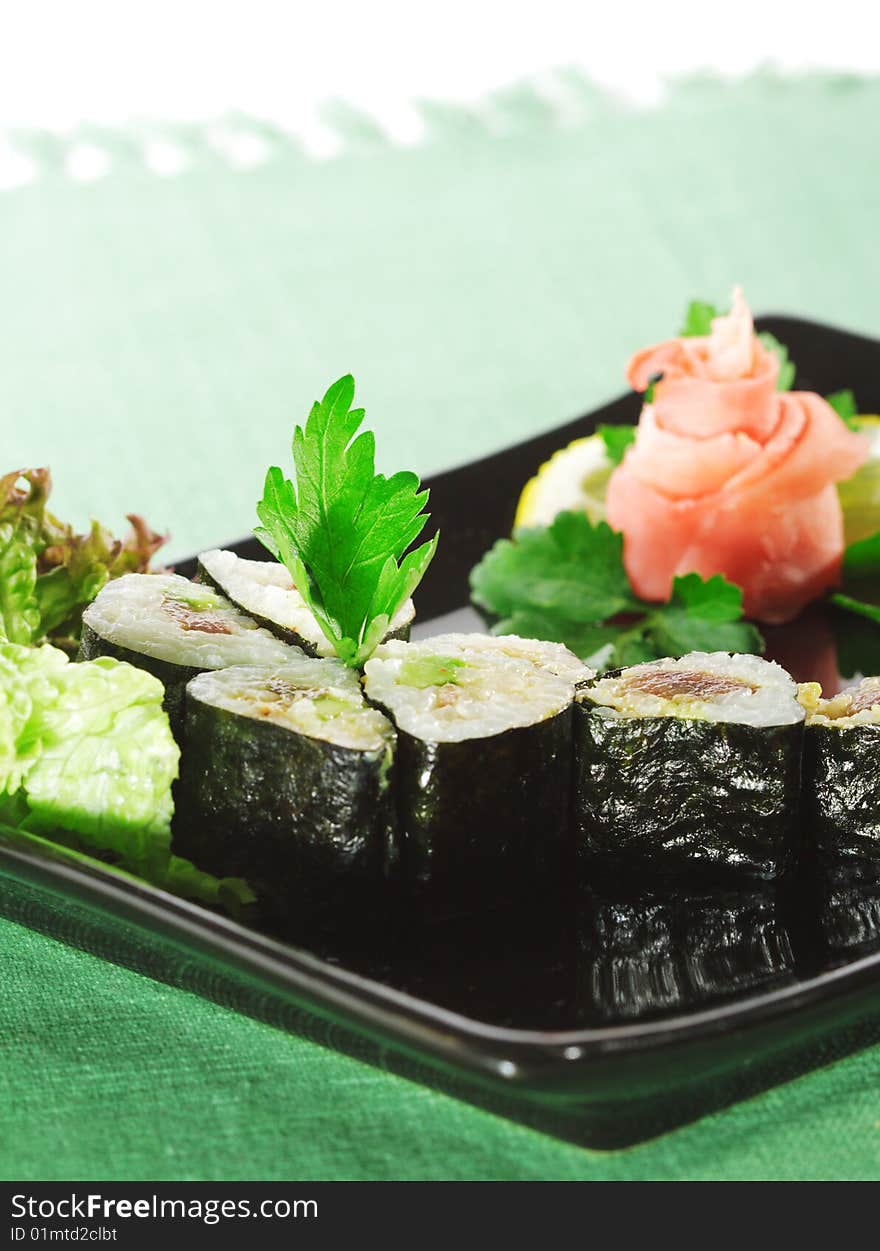 Japanese Cuisine - Sushi with Salad Leaf and Parsley