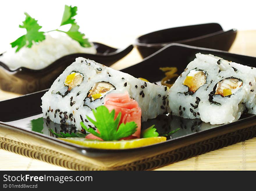 Japanese Cuisine - Sushi with Salad Leaf and Parsley