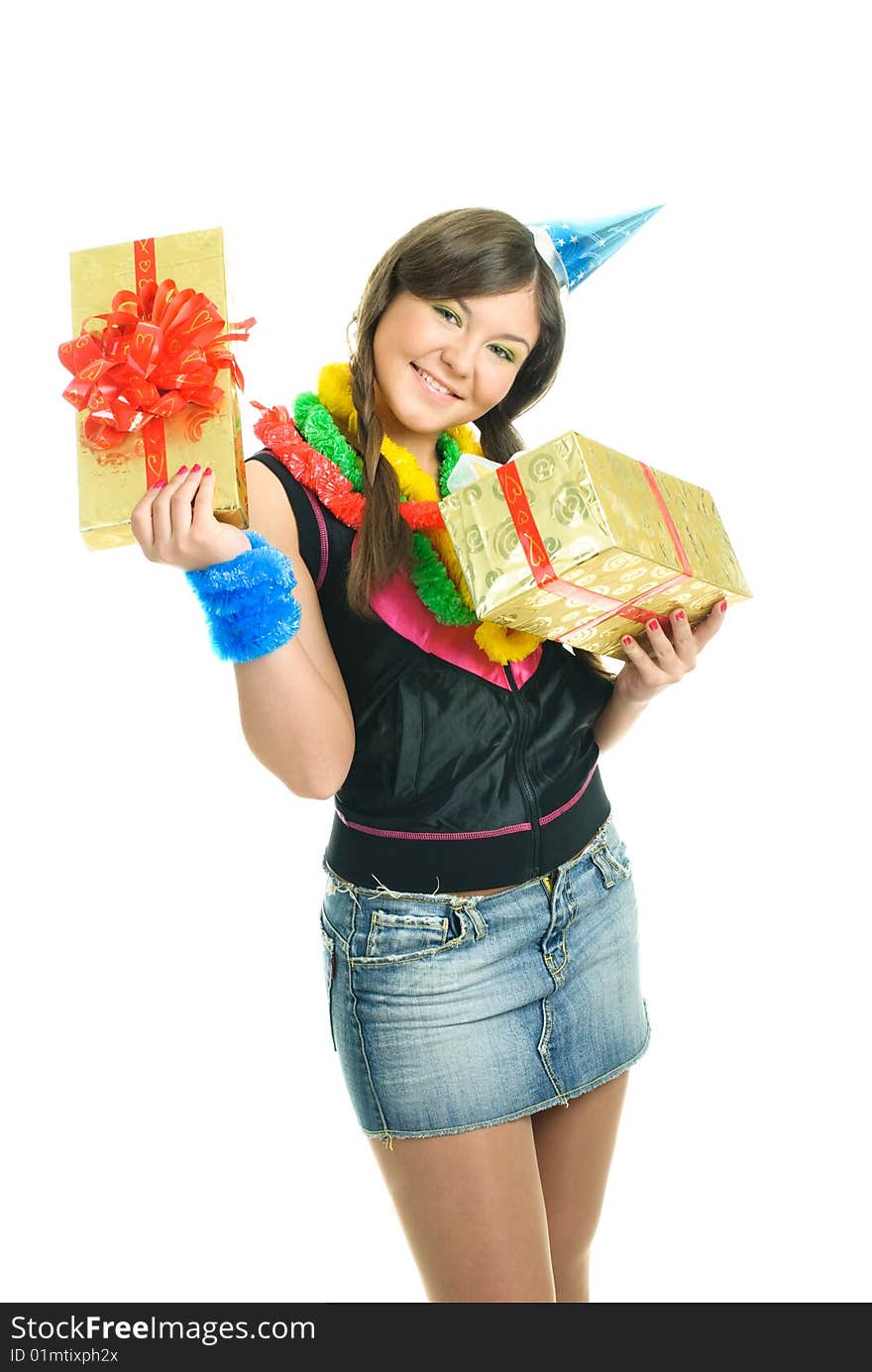 Happy young beautiful girl with a present in her hands celebrating her birthday. Happy young beautiful girl with a present in her hands celebrating her birthday