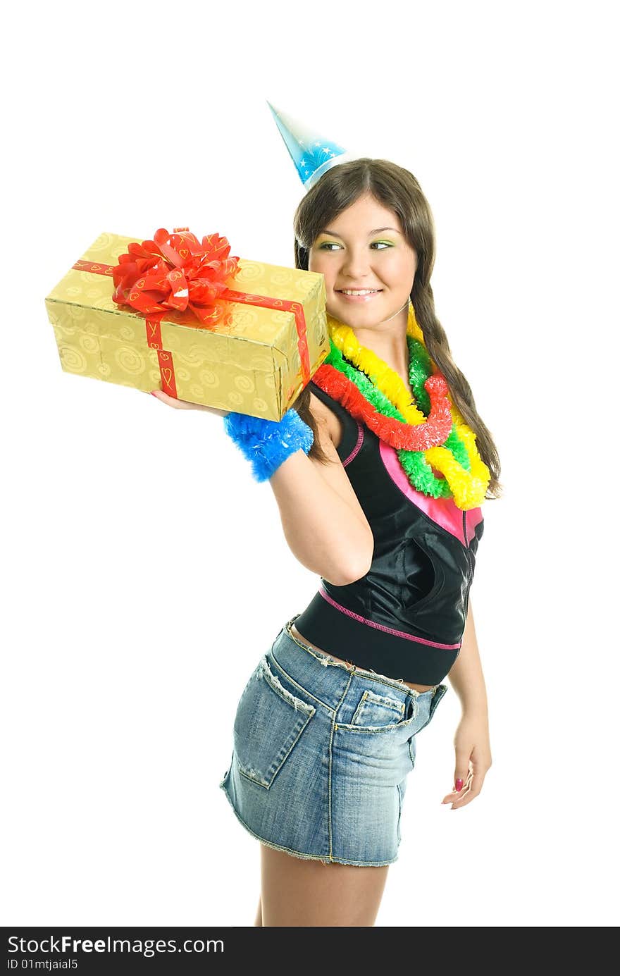 Happy young beautiful girl carrying a birthday present in her hands. Happy young beautiful girl carrying a birthday present in her hands