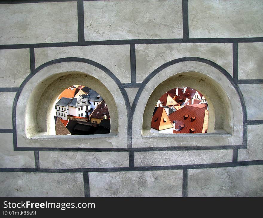 View through windows in castle wall at the old town Krumlov in Czech Republic. View through windows in castle wall at the old town Krumlov in Czech Republic