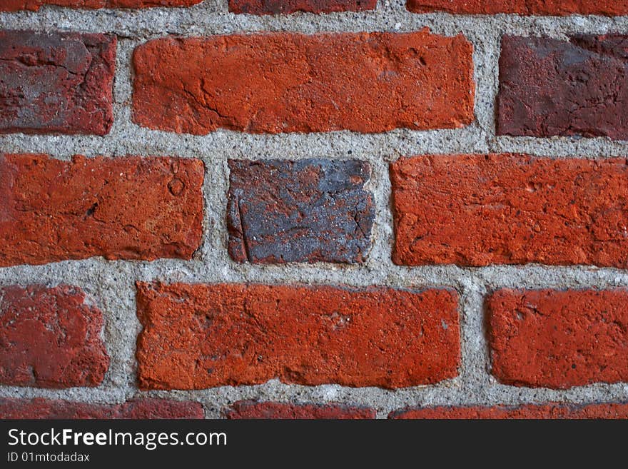 A old, red brick wall. A old, red brick wall