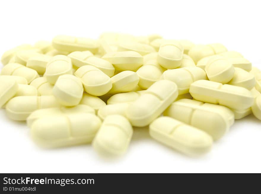 Stack of big pills isolated. Stack of big pills isolated