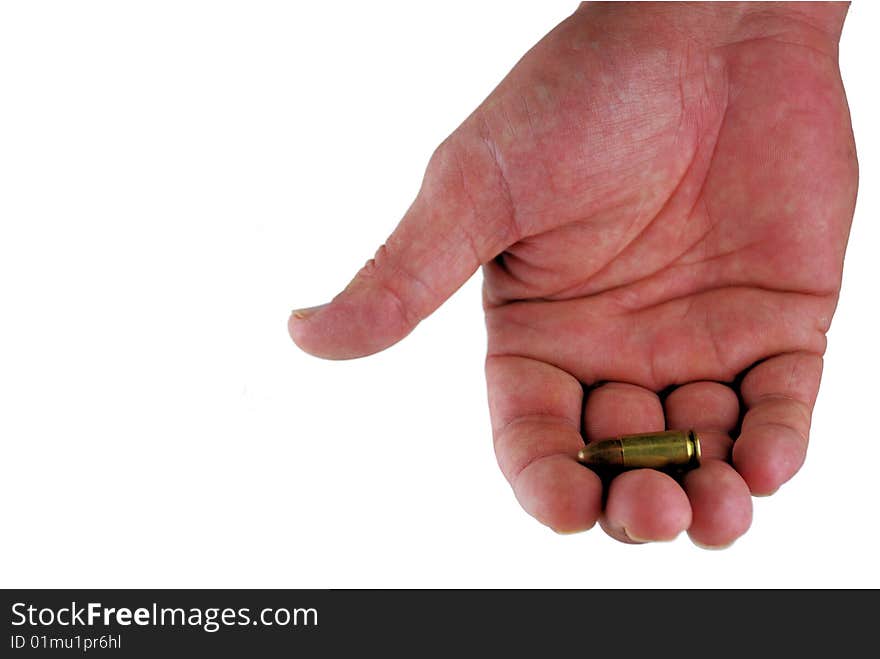 A man's hand holding a bullet; isolated on white.