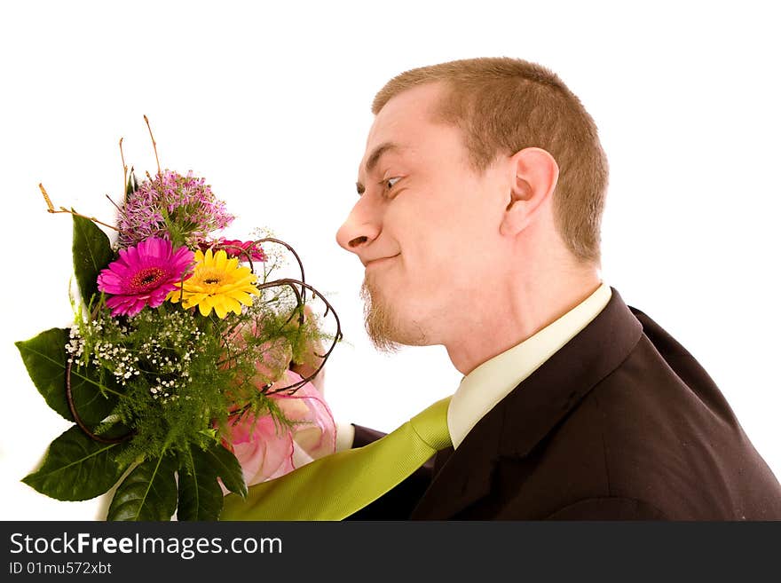 Man with flowers on white