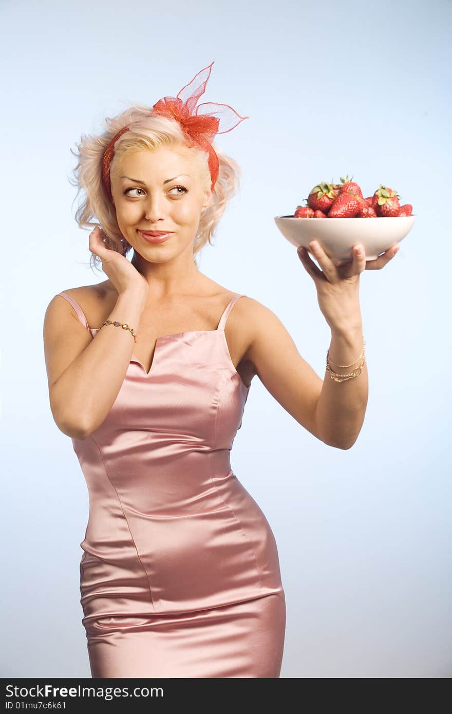 Woman with bowl with strawberry