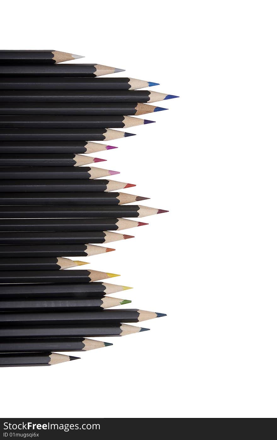 Twenty four colored pencils in a row shot from above isolated on white background