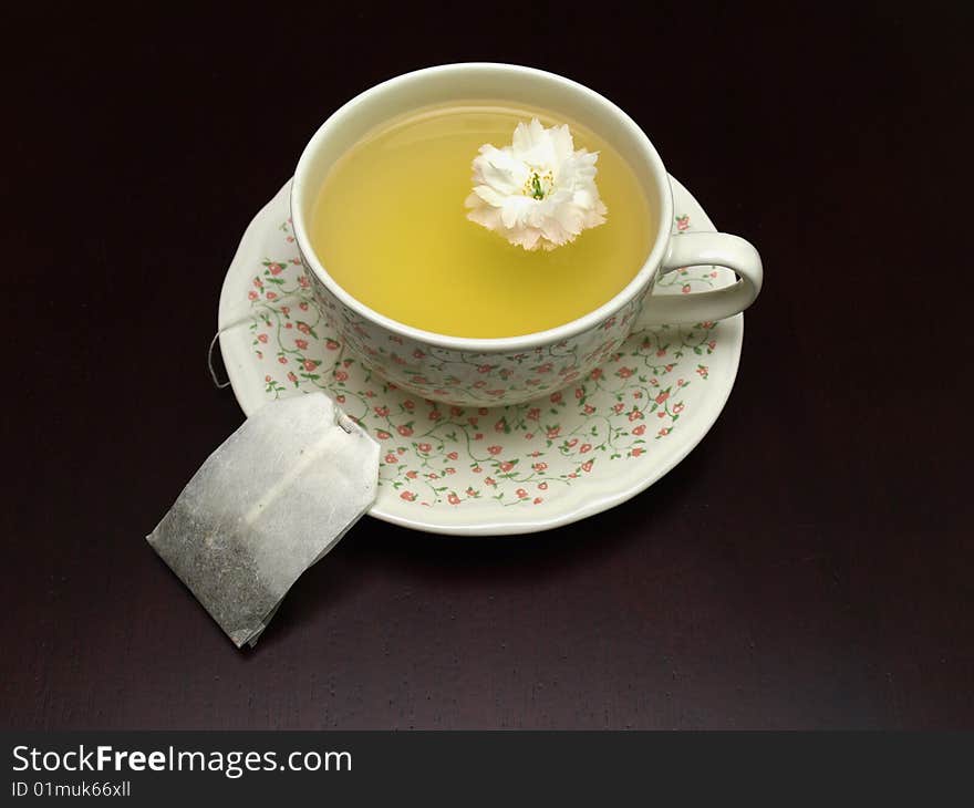 British teacup and teabag on a table