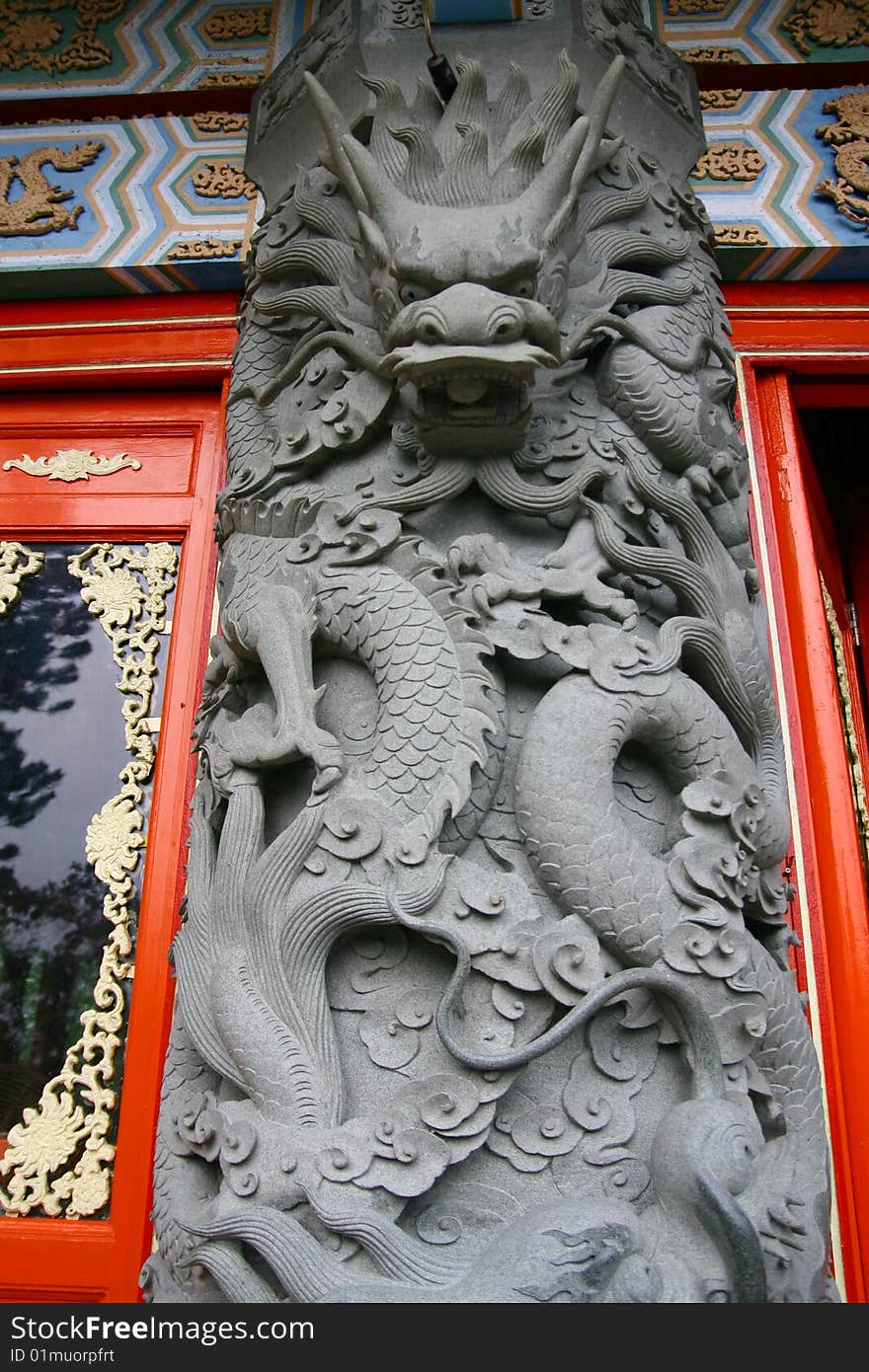 Stone Tiger Dragon ornament on a buddhist temple in Lantau Hong Kong. Stone Tiger Dragon ornament on a buddhist temple in Lantau Hong Kong