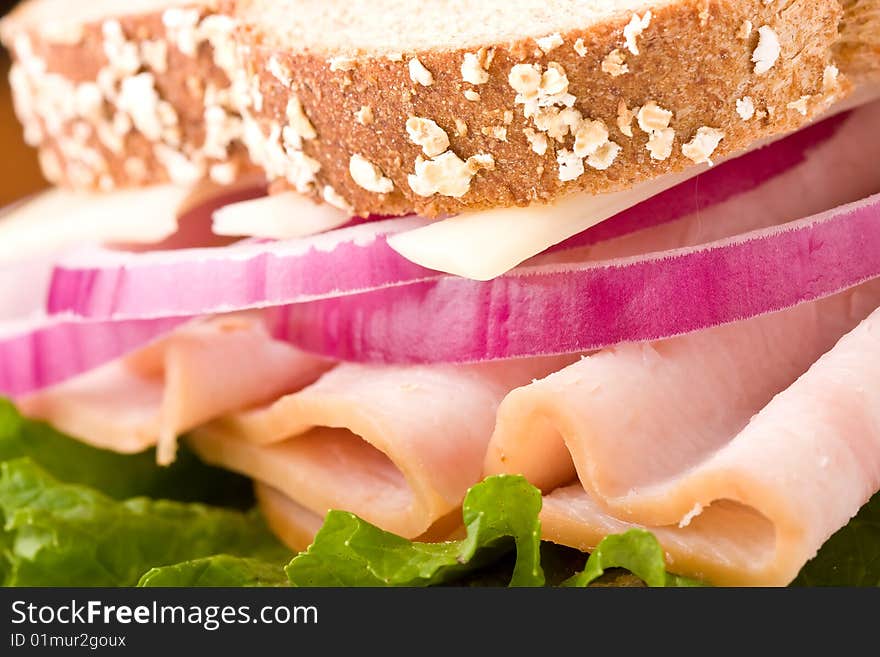 A healthy turkey sandwich on whole wheat bread