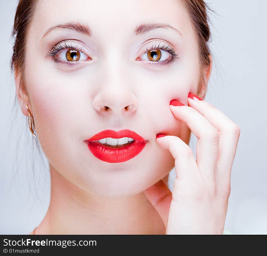 Young pretty girl with red lips