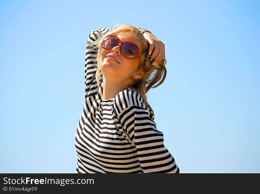 A young girl on the seashore, summer. A young girl on the seashore, summer