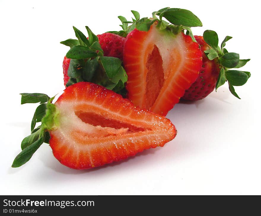 An arrangement of strawberries on a white background. An arrangement of strawberries on a white background