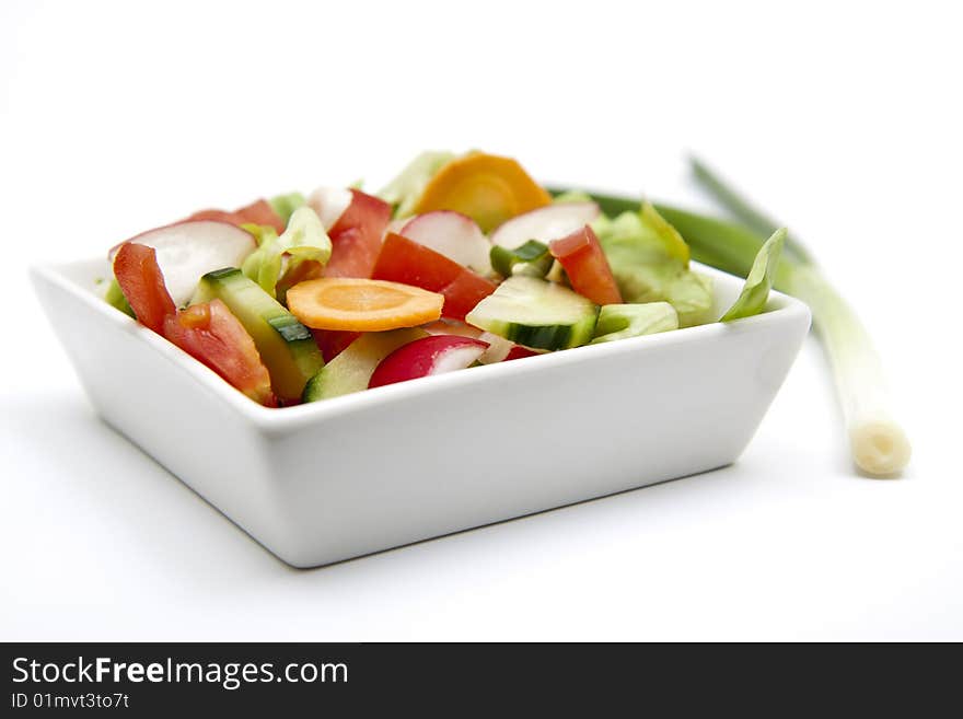 Isolated mixed salad with green onion