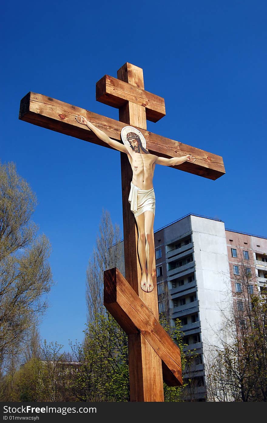 Chernobyl area.Cross in memory of city. Lost city Pripyat. Modern ruins. Ukraine. Kiev region.