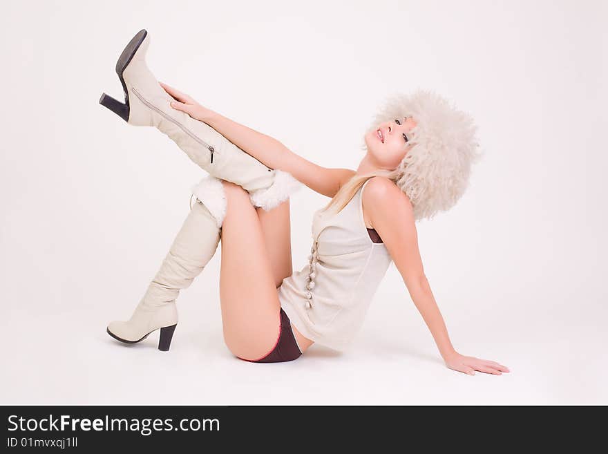 Young girl in white clothes, studio shot