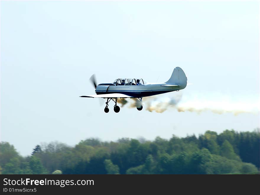 A stunt pilot plane during a flight show.